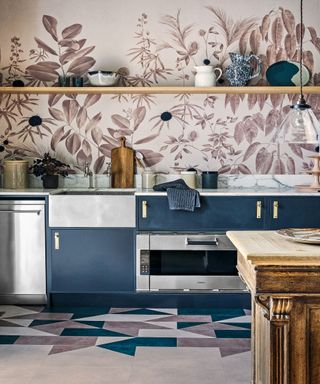 kitchen with botanical wallpaper, marble countertops and purple cupboards