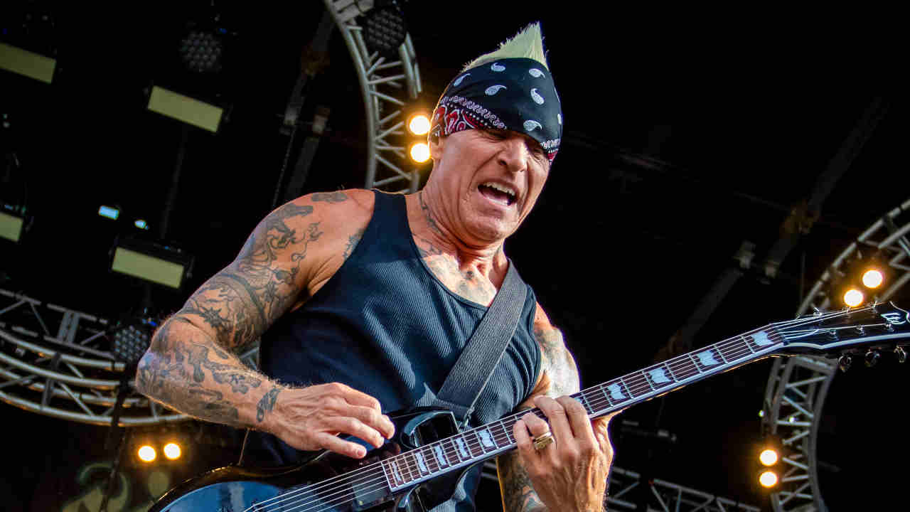 Sick Of It All&rsquo;s Lou Koller performing onstage in 2018