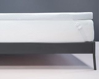 Subrtex Gel-Infused Memory Foam Mattress Topper on top of mattress from side video to see depth and straps