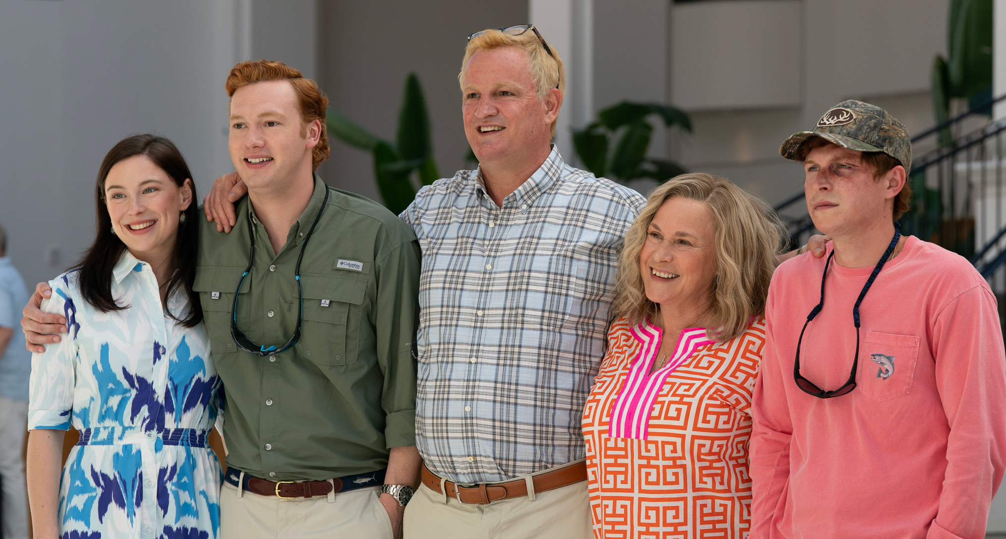 a family poses for a picture smiling in a still from murdaugh death in the family