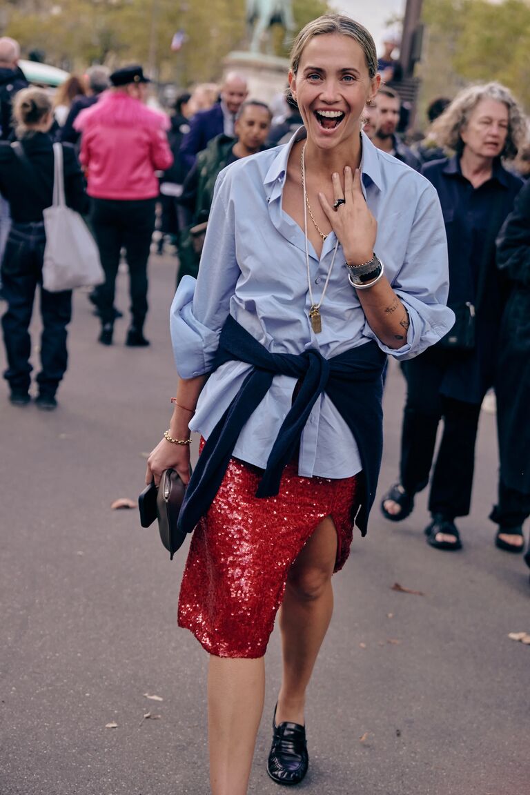 woman at fashion week wearing a loafer outfit