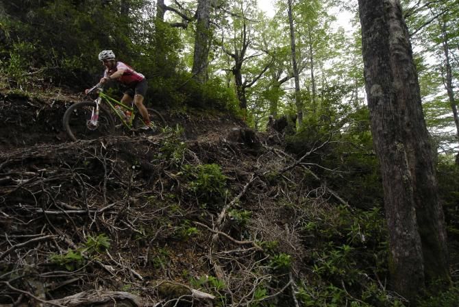 A rider descends singletrack in Chile