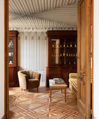 Kubilai's Tent wallcovering in Beige by Iksel installed at the Hotel St. James Paris by designer Laura Gonzale