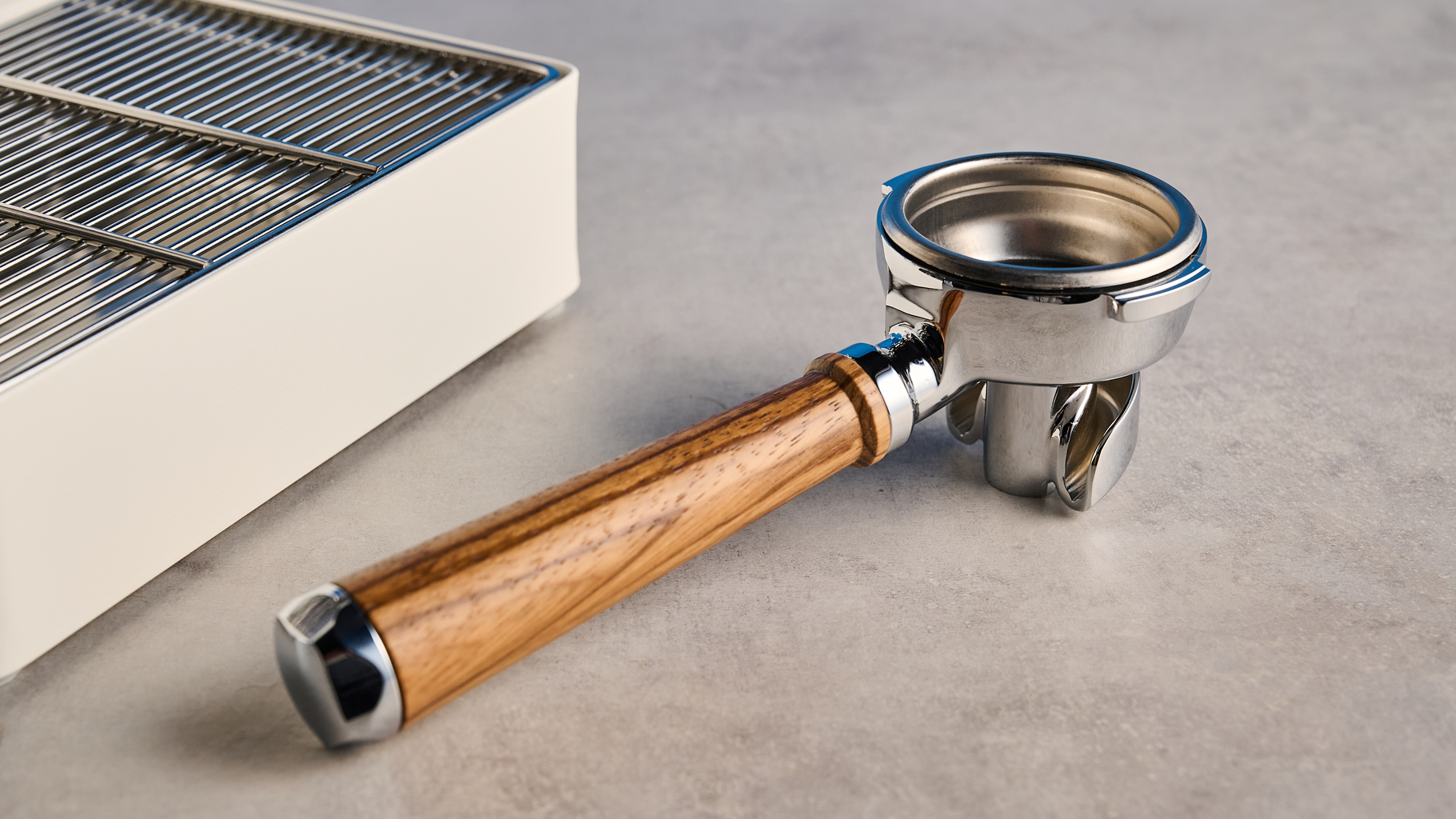 the lelit mara x3 in white and walnut photographed against a blue tom's guide background