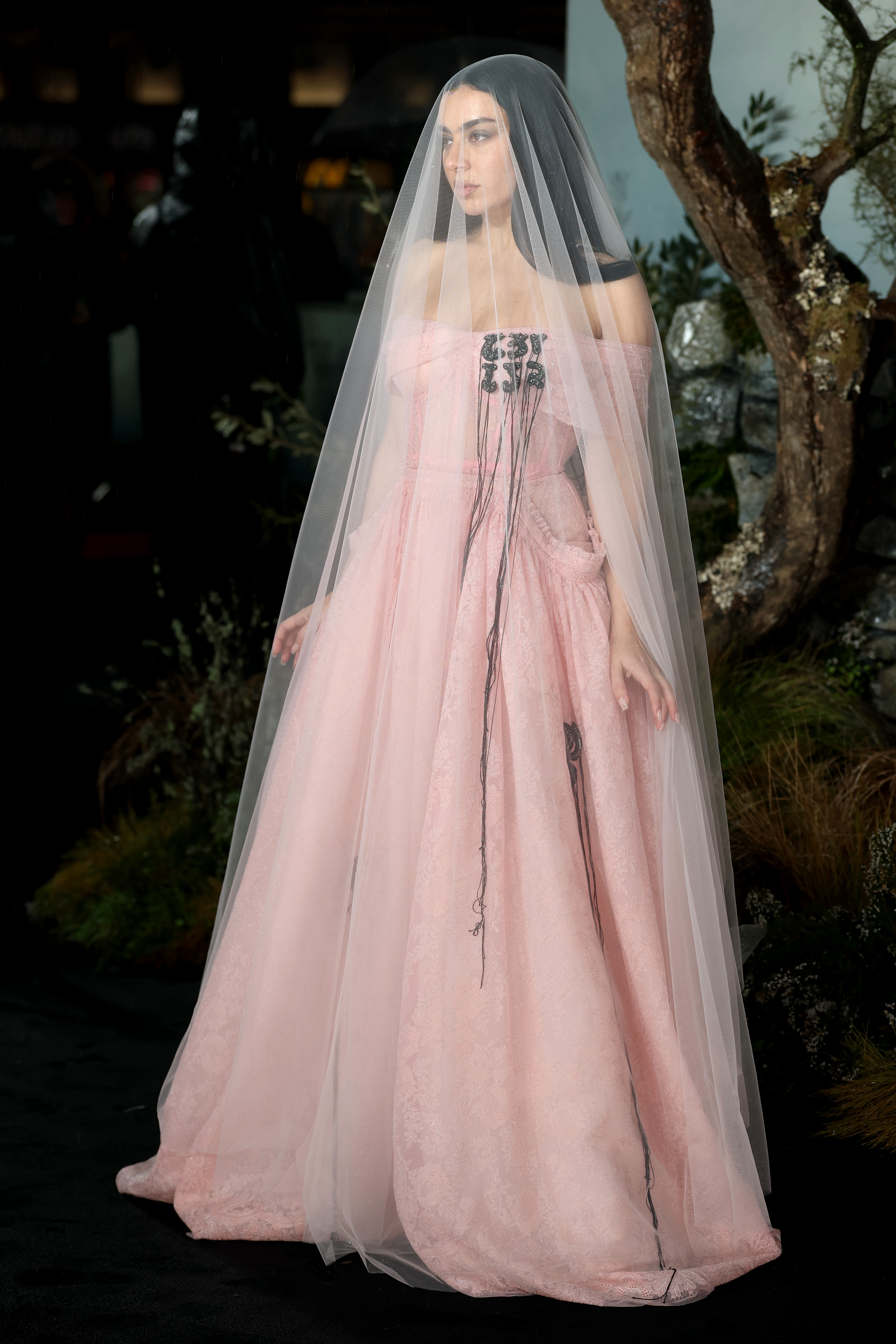 Charli xcx arrived at the London premiere of Wuthering Heights looking every bit a brat bride in a pink gown and veil