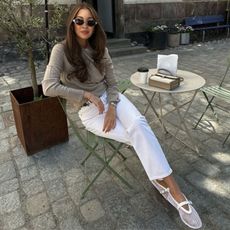 Felicia Akerstrom wears Alaïa ballet flats.