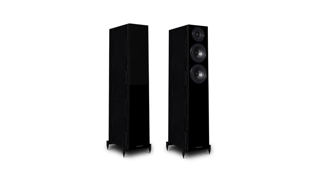 A pair of Wharfedale Diamond 12.3 floorstanding speakers in black on a white background
