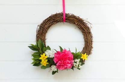 A homemade Easter wreath using real flowers
