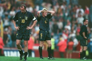 Scotland players look dejected after elimination in the group stages of Euro 96.