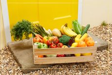 Food box of fruit and vegetables on a doorstep