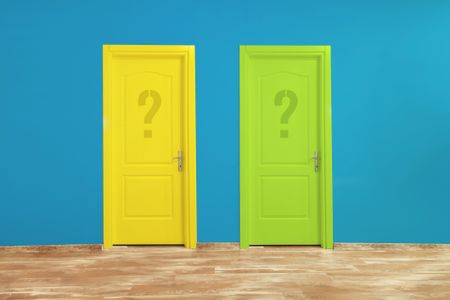 Two doors one yellow and one green next to one another on a blue wall