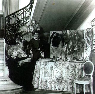Two women at the perfume table in Dior's original Parisian boutique