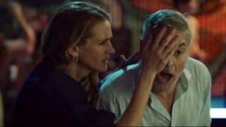 Julia Roberts and George Clooney playing beer pong in Ticket to Paradise