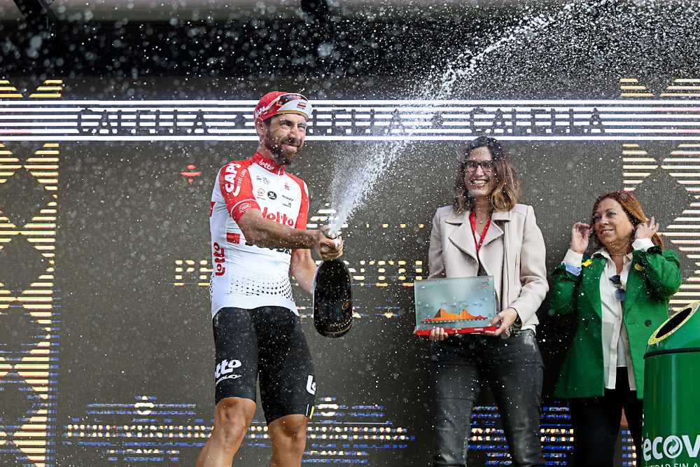 Thomas De Gendt celebrates on the podium after winning stage 1 at Volta a Catalunya