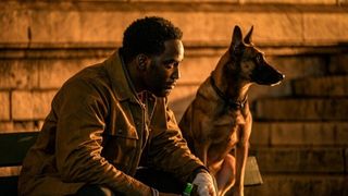 Shamier Anderson and a dog in John Wick: Chapter 4