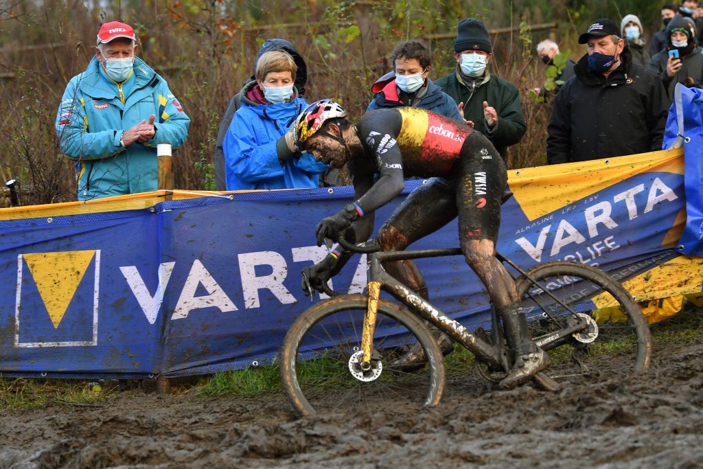BOOM BELGIUM DECEMBER 04 Wout Van Aert of Belgium and Team Jumbo Visma competes on a muddy sector during the 7th Superprestige Cyclocross Boom 2021 Mens Elite SPBoom Superprestige2022 on December 04 2021 in Boom Belgium Photo by Luc ClaessenGetty Images