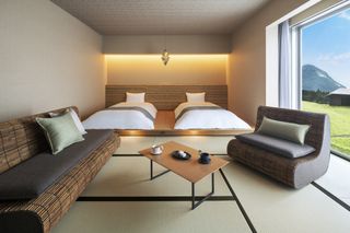 a minimalist room at japanese hotel KAI Yufuin by Kengo Kuma