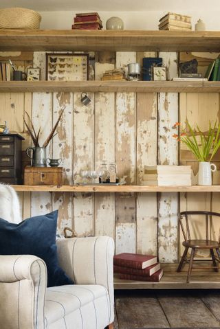 A renovated rustic cottage with distressed wooden shiplap