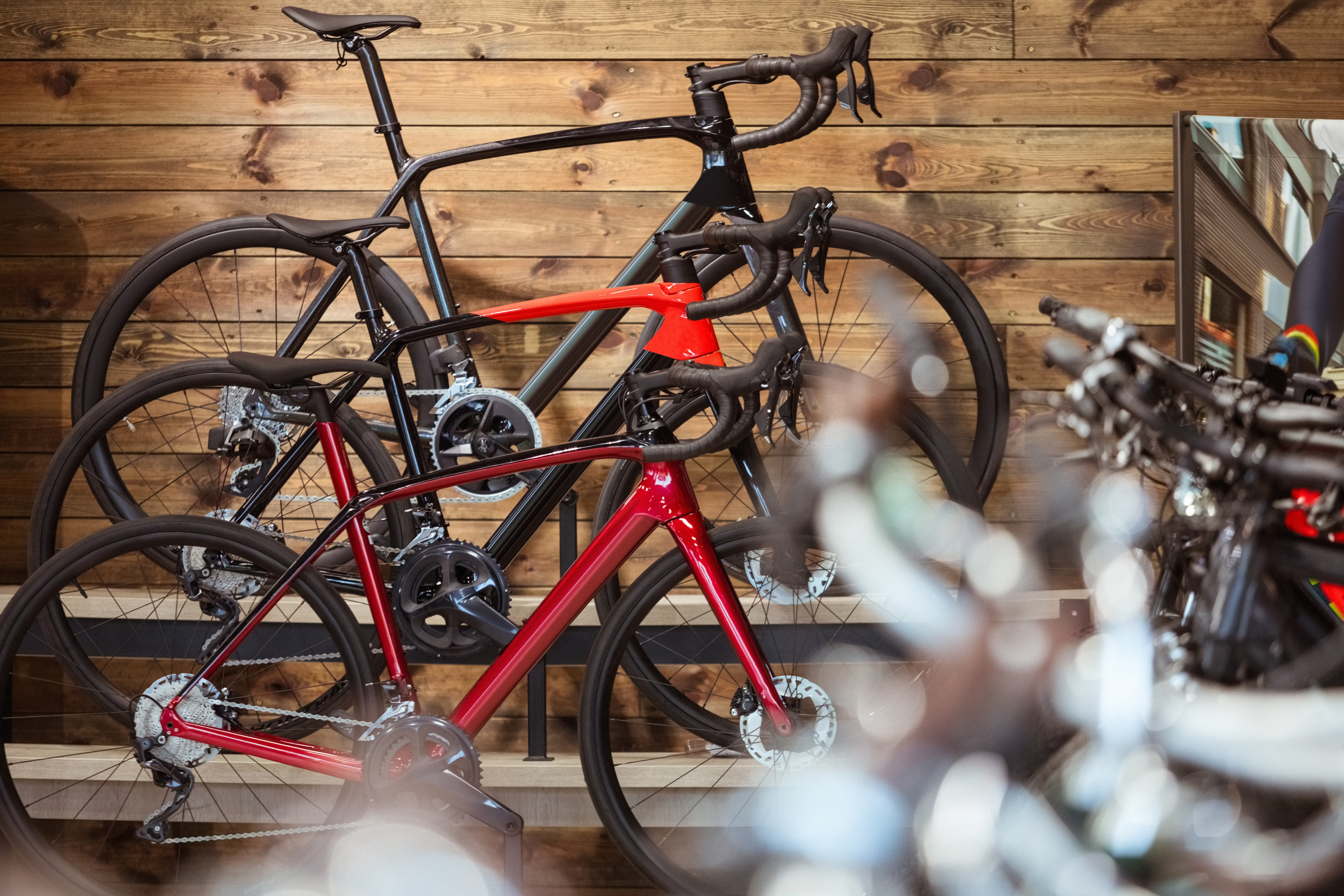 Three road bikes in a bike shop