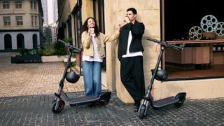 Two people using the Segway Ninebot F3.