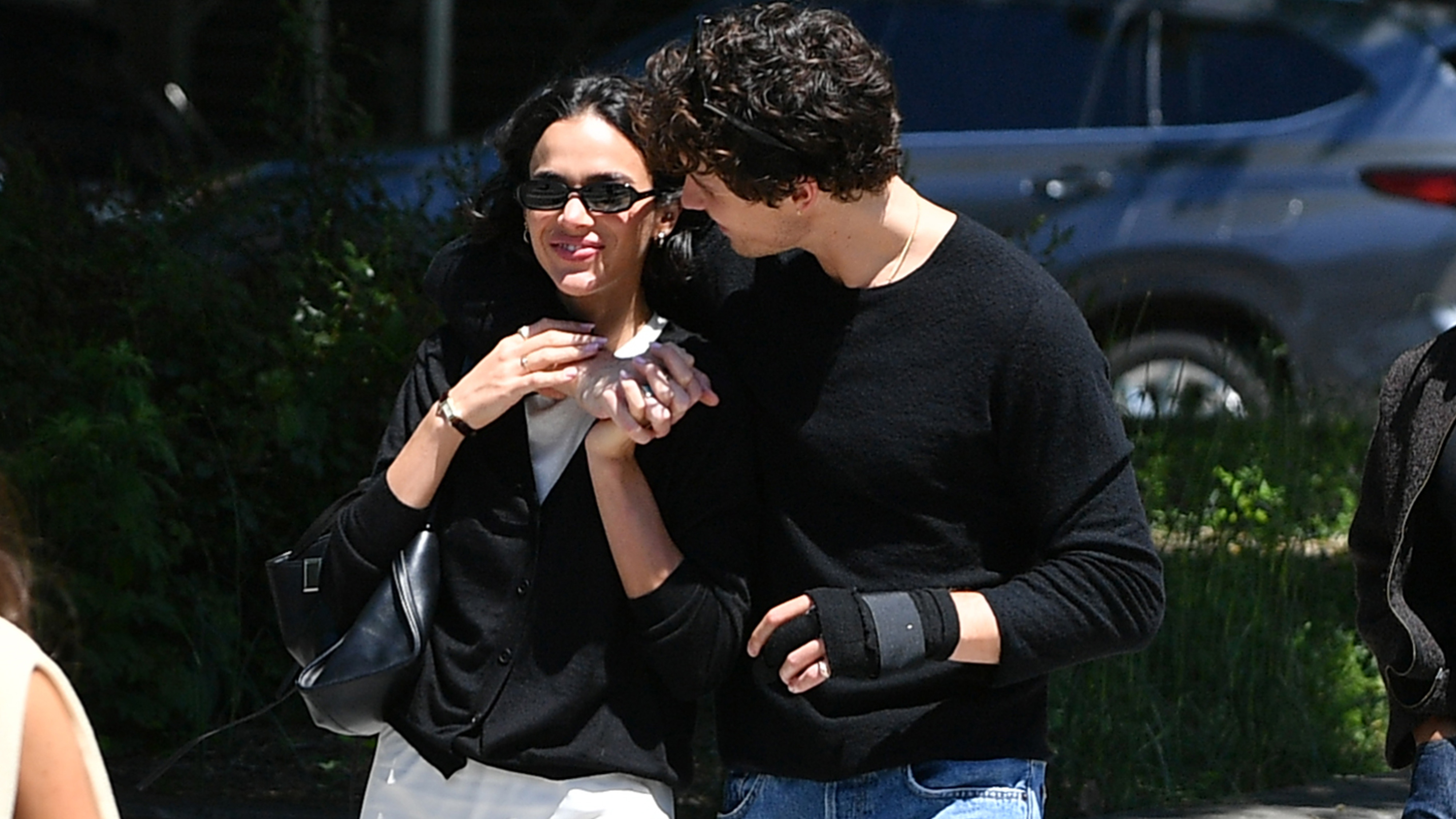 05/16/2026: Shawn Mendes and Bruna Marquezine in New York City. The Canadian singer and the Brazilian actress shared a kiss while heading to take a romantic waterfront stroll. Marquezine wore a black cardigan, white lace skirt, and black loafers