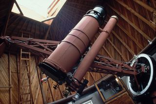 The Pluto Discovery Telescope as seen inside its open dome at Lowell Observatory.