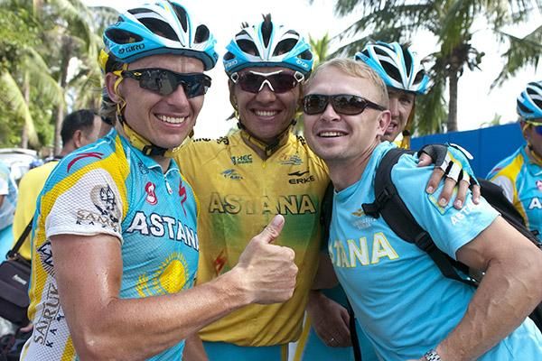 Tour winner Valentin Iglinskiy (centre) with Astana teammate and brother, Maxim (left), and a team staff member after the completion of the tour in Sanya.