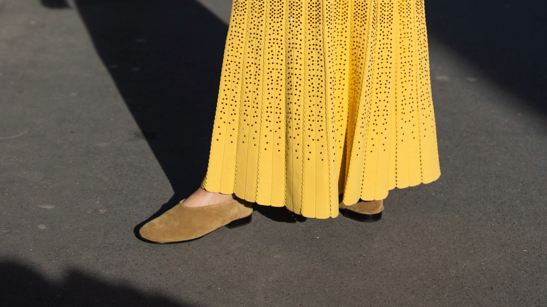 woman wearing yellow dress and almond-toed flats