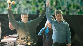 Liam Gallagher (L) and Noel Gallagher (R) of Oasis perform during the opening night of their Live 25' Tour at Principality Stadium on July 04, 2025 in Cardiff, Wales