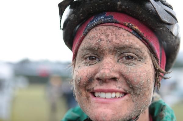 Lots of muddy smiling faces at the finish - one day to go and clearing skies.