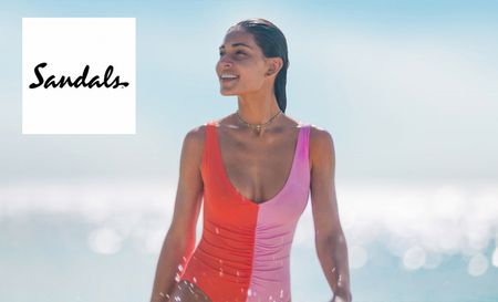 Woman wearing red and pink one piece bathing suit
