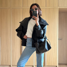 woman wearing slim jeans with leather jacket and ballet flats