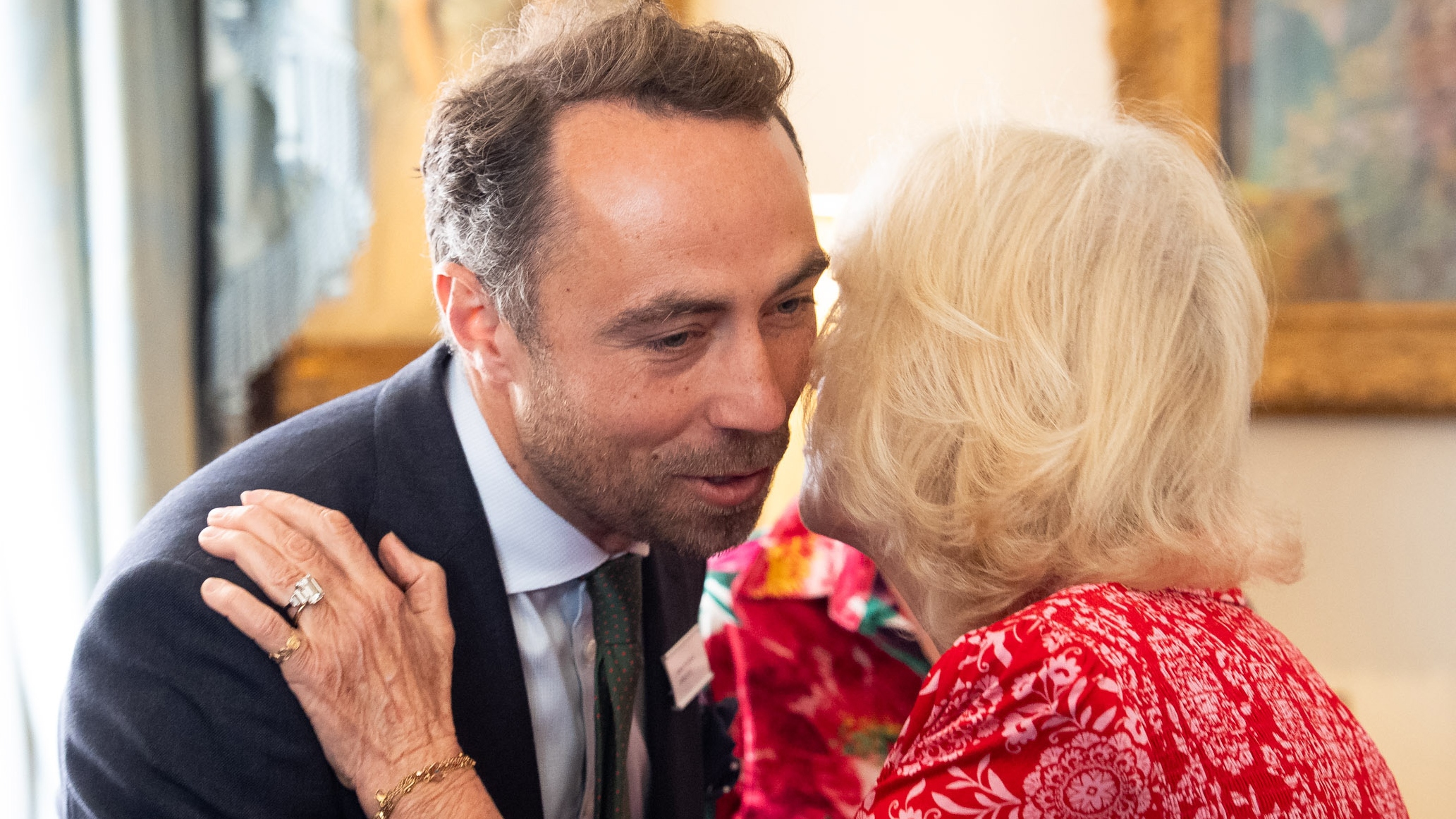 Queen Camilla, Patron of Medical Detection Dogs (MDD) greets James Middleton during a reception to celebrate the charity at Clarence House on May 12, 2026