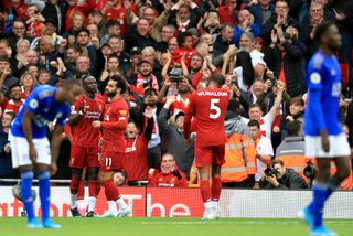 Sadio Mane, second left, is congratulated by Mohamed Salah after opening the scoring