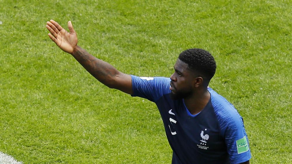 Slam dunk? - Umtiti sees funny side of handball in World Cup opener ...