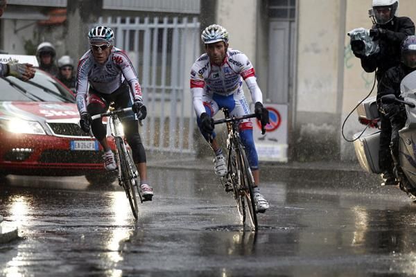 Philippe Gilbert, left, and Michele Scarponi in the lead of the Tour of Lombardy.