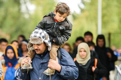 Migrants cross Slovenian-Austrian border