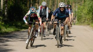 Valtteri Bottas and Tiffany Cromwell lead a group of gravel riders