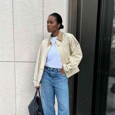 woman wearing beige Uniqlo cord collar jacket