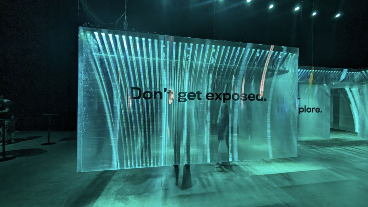 Maze made up of translucennt plastic sheets with cyber slogan &quot;Don&#039;t get exposed&quot; printed on it