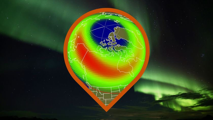 NOAA aurora forecast map for the night of Oct. 29, 2025, showing the probability of visible northern lights over North America. A bright red and green auroral oval is centered over Canada and the Arctic, with a red &quot;view line&quot; indicating the southernmost edge where auroras may be visible on the northern horizon. Several northern U.S. states lie just above the view line.
