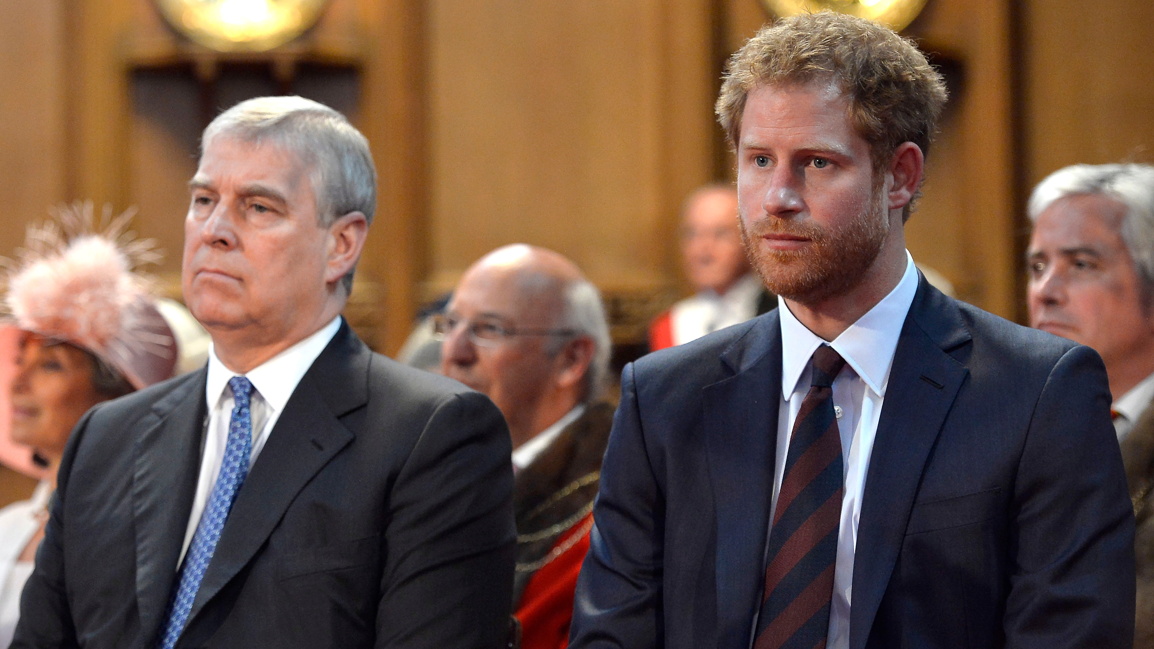 Andrew and Prince Harry during a reception at the Guildhall following the National Service of Thanksgiving for Queen Elizabeth II's 90th birthday at St Paul's Cathedral on June 10, 2016