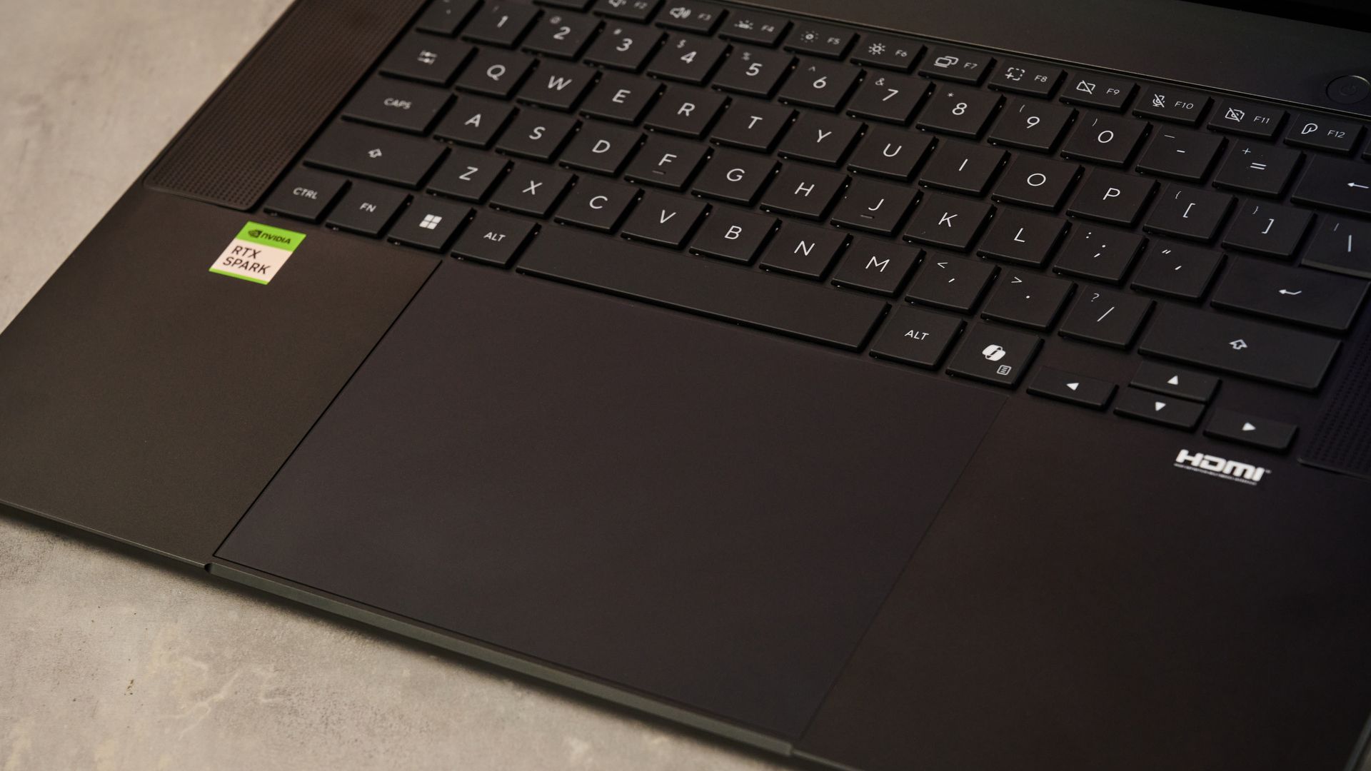 A closeup of the Asus ProArt P16 RTX Spark's keyboard and trackpad.