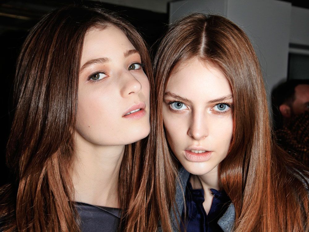 Photo of models backstage at fashion week