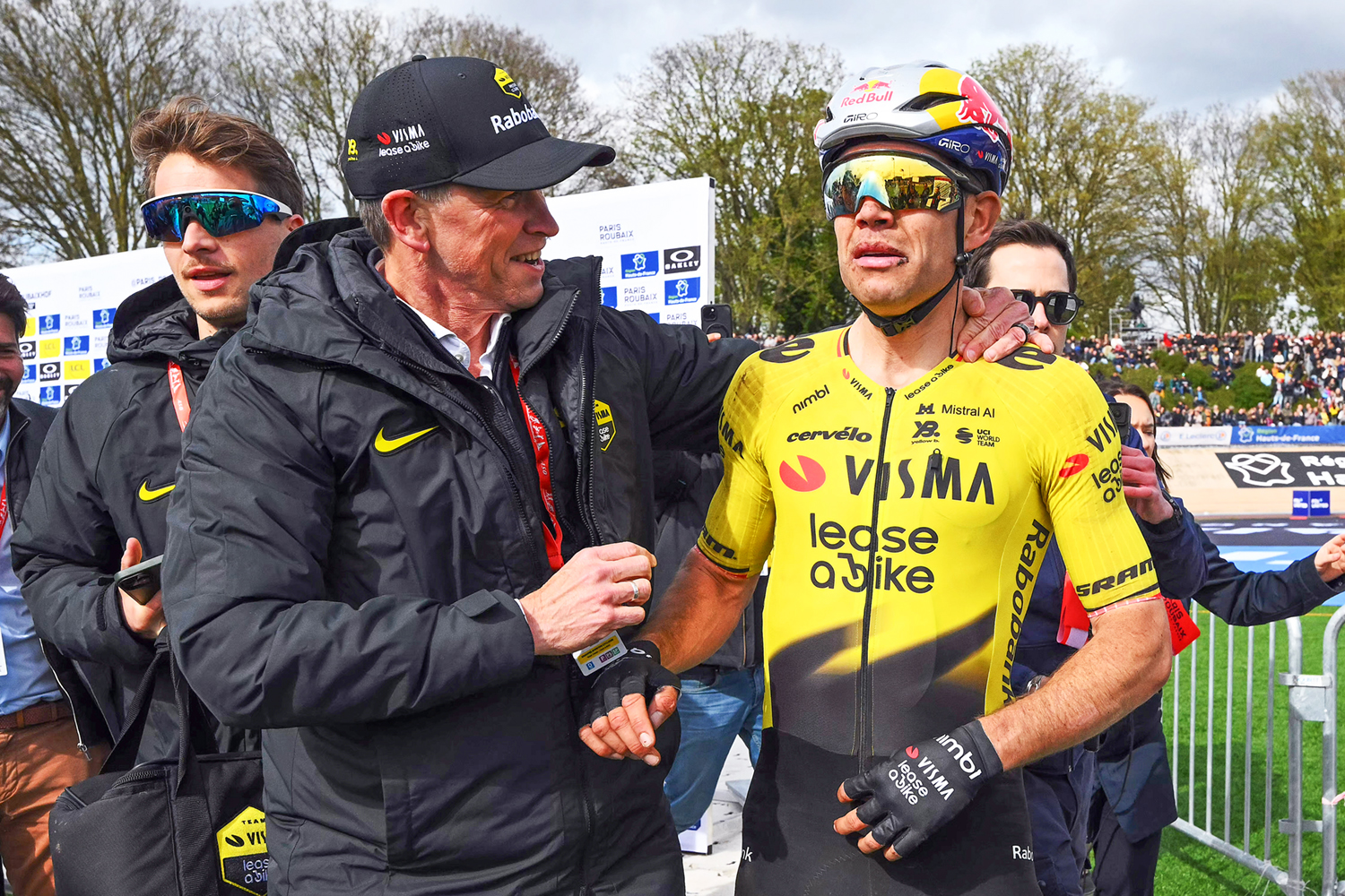 ROUBAIX, FRANCE - APRIL 12: (L-R) Managing Director/CEO of Team Visma | Lease a Bike - Richard Plugge and the race winner Wout van Aert of Belgium and Team Visma | Lease a Bike react after the 123rd Paris-Roubaix Hauts-de-France 2026 - Men's Elite a 258.3km one day race from Compiegne to Roubaix / #UCIWT / on April 12, 2026 in Roubaix, France. (Photo by Etienne Garnier - Pool/Getty Images)