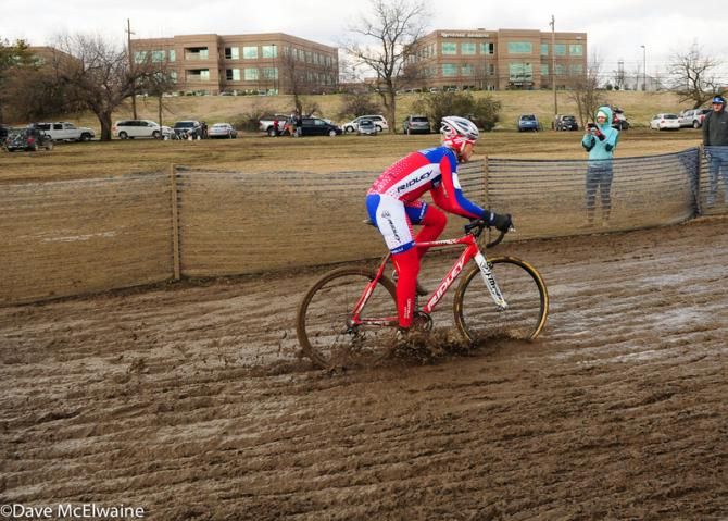 Sue Butler (USA) takes the hole shot in the deep mud