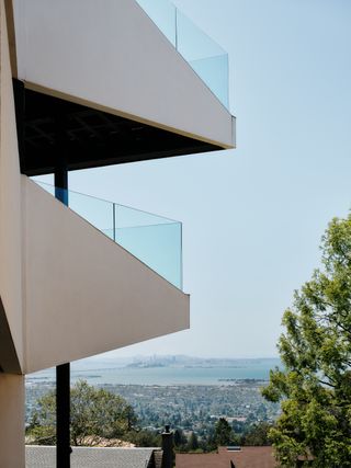 balconies against blue water views at Space Invader house