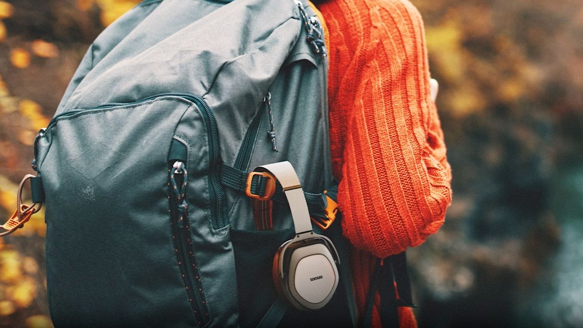 Adobe Firefly explained; a render of headphones on a backpack