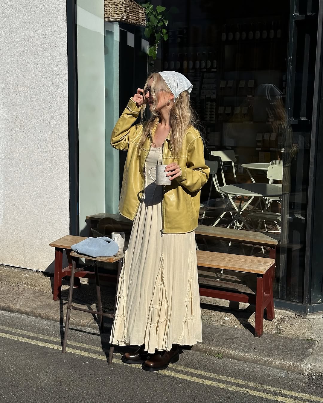 woman wearing maxi dress with white handkerchief in hair
