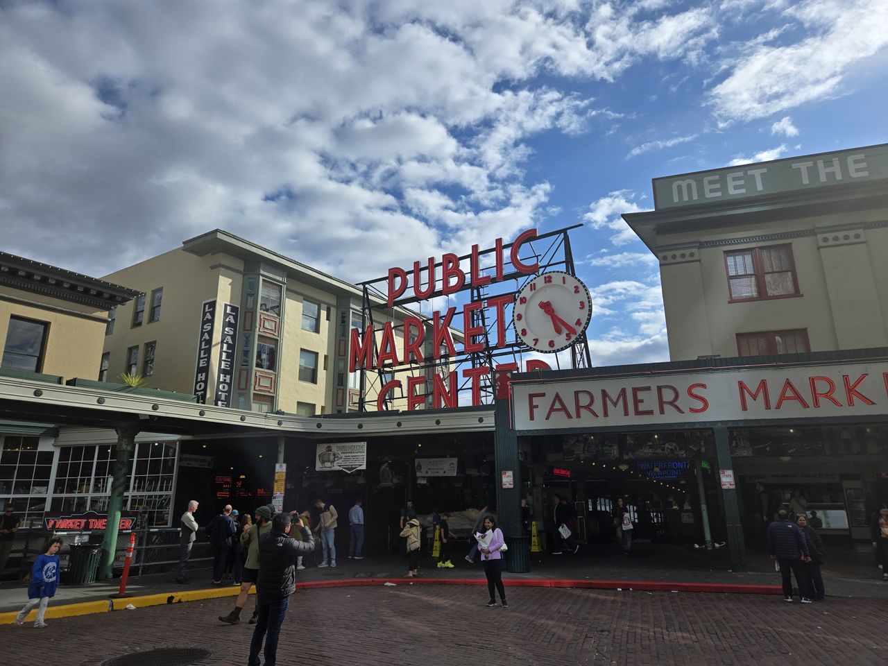 A red Public Market Center sign